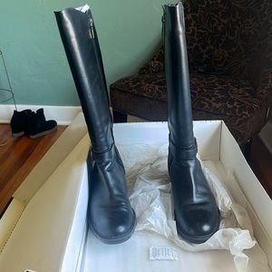 Blondo knee high leather boots.  Worn one time.  I’m very good condition.